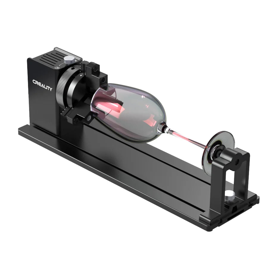 A black cylindrical Falcon2 Pro 40W Enclosed Laser Engraver and Cutter Master Engraving Bundle by CrealityFalcon, designed for precision work on small, cylindrical objects. Featuring a versatile design, the device is mounted on a sturdy base with a rotary attachment for secure holding. The laser is shown focused on a glass object for engraving. A black cylindrical Falcon2 Pro 40W Enclosed Laser Engraver and Cutter Master Engraving Bundle by CrealityFalcon, designed for precision work on small, cylindrical objects. Featuring a versatile design, the device is mounted on a sturdy base with a rotary attachment for secure holding. The laser is shown focused on a glass object for engraving.