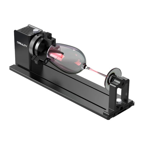 A black cylindrical Falcon2 Pro 40W Enclosed Laser Engraver and Cutter Master Engraving Bundle by CrealityFalcon, designed for precision work on small, cylindrical objects. Featuring a versatile design, the device is mounted on a sturdy base with a rotary attachment for secure holding. The laser is shown focused on a glass object for engraving. A black cylindrical Falcon2 Pro 40W Enclosed Laser Engraver and Cutter Master Engraving Bundle by CrealityFalcon, designed for precision work on small, cylindrical objects. Featuring a versatile design, the device is mounted on a sturdy base with a rotary attachment for secure holding. The laser is shown focused on a glass object for engraving.