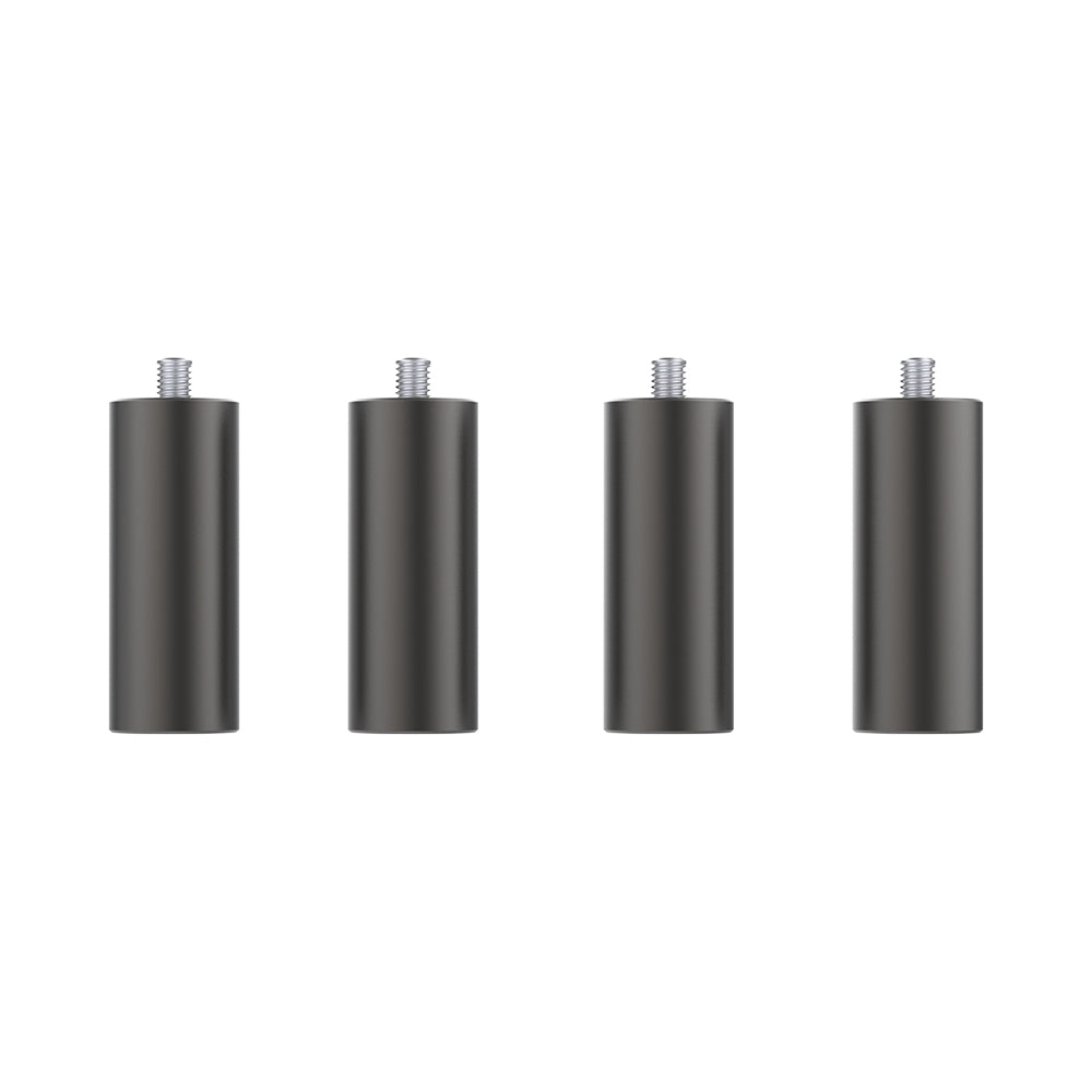 An image of four identical cylindrical metal furniture legs with threaded bolts on top, evenly spaced in a row against a white background. Matte black in color, these versatile legs can be customized with precision using CrealityFalcon Extra Risers - 4 Packs for Falcon2 Engraver Series machines.