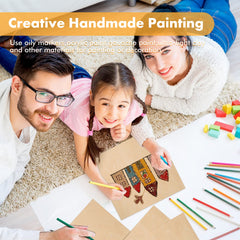 A man, woman, and girl smile while lying on the floor drawing a colorful house on brown paper. They are surrounded by art supplies including colored pencils and CrealityFalcon A4 Basswood Plywood Sheets 1/8" x 8.27" x 11.69" for Laser Engraving and Cutting - Pack of 6pcs. Text overlay reads, "Creative Handmade Painting" and lists various eco-friendly materials for use.