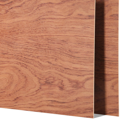 Two sheets of CrealityFalcon Bubinga Brazilian Rosewood Plywood Sheets 11.8" x 11.8" for Laser Engraving and Cutting - 6pcs are depicted standing upright. The wood features a natural, light brown grain pattern with distinct, slightly curved lines that give it a textured appearance. The edges of the plywood sheets are sharp and cleanly cut, ideal for precise laser engraving. 1600