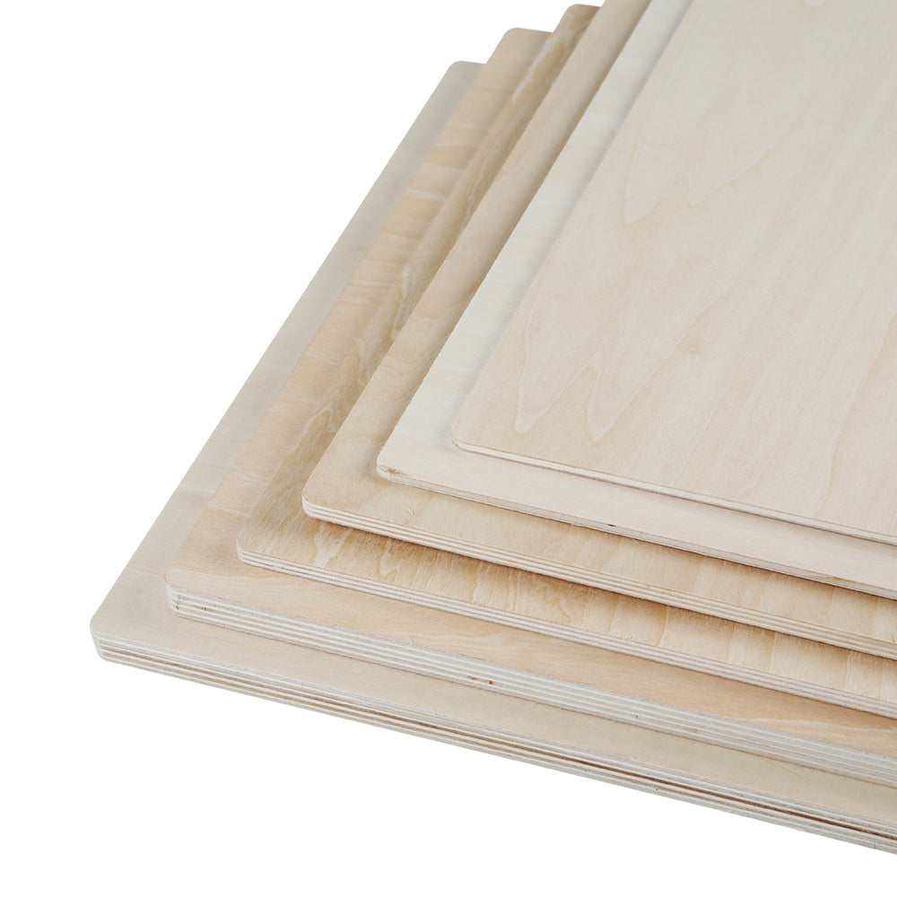 A stack of six CrealityFalcon Basswood Plywood Sheets 11.8" x 11.8" for Laser Engraving - Pack of 10pcs, 6pcs and 3pcs, each slightly smaller than the one below it, ideal for DIY projects. The light-colored boards display visible wood grain patterns and have smooth surfaces and edges. They are neatly arranged, showcasing varied sizes from largest at the bottom to smallest at the top.