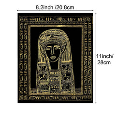 A gold-colored drawing of an Egyptian pharaoh with a headdress on a black background. The rectangular artwork, crafted on CrealityFalcon's A4 Scratch Paper for Falcon Laser Engraving - Pack of 5 Colors and 50 Sheets, measures 8.2 inches (20.8 cm) wide by 11 inches (28 cm) tall. The border surrounding the portrait contains various Egyptian symbols and patterns.