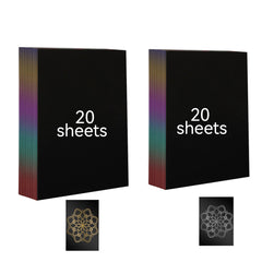 Two stacks of A4 Gold Silver Scratch Paper for Falcon Laser Engraving - Pack of 40pcs by CrealityFalcon, each consisting of 20 sheets, showcase artistic creativity. The edges have a gradient of rainbow colors. Beneath each stack is an example of artwork featuring an intricate flower design created by scratching the black surface.