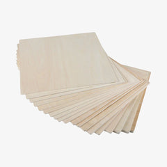 A stack of CrealityFalcon 8*8*1/8'' Laser Module Basswood Plywood Sheets(10pcs) is fanned out to show the edges and surface. The panels have a light natural wood finish and smooth texture, perfect for DIY projects or use with a laser engraver.